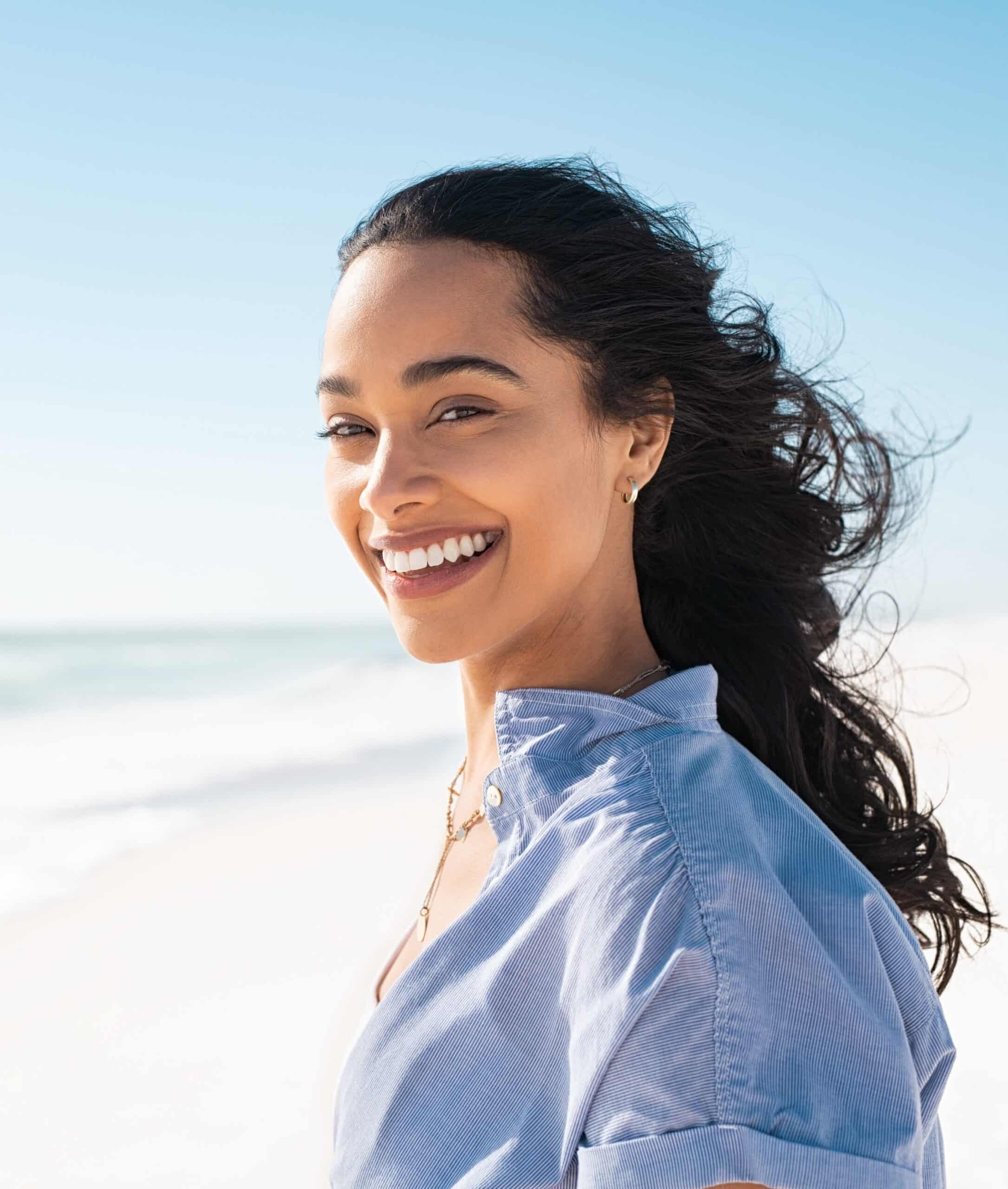 Portrait of natural beauty woman at beach Bon air dentist