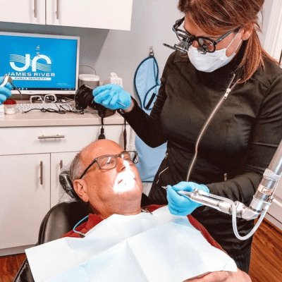 The link between diabetes and oral health: what you need to know 3 James river family dentistry team member working on an older patient's teeth, representing diabetes and oral health